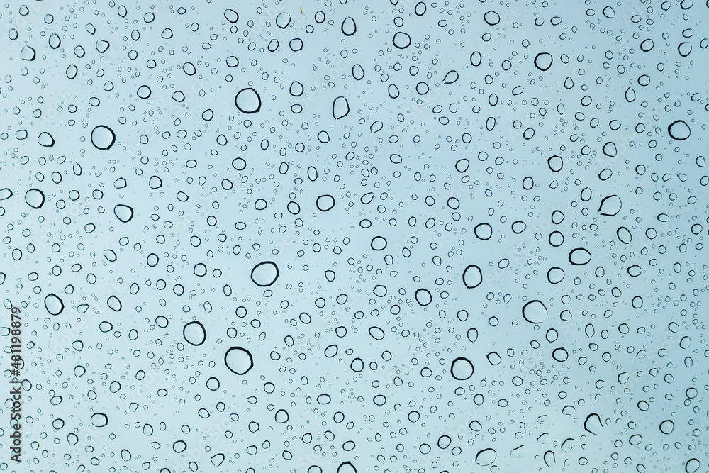 Water drops on window mirror car abstract background. Water drops on window mirror car abstract background.