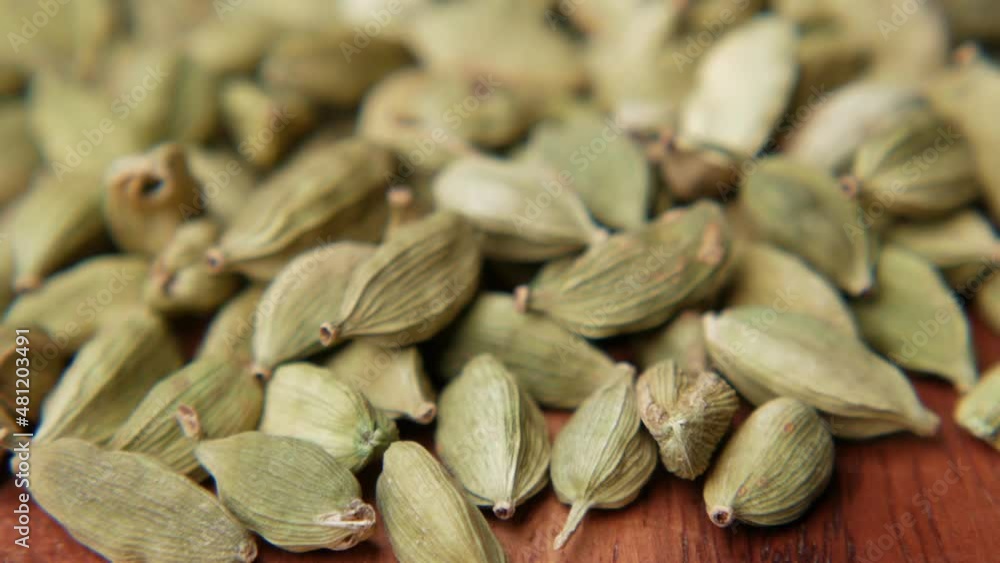close up of Cardamom on a chopping board close up of Cardamom on a chopping board