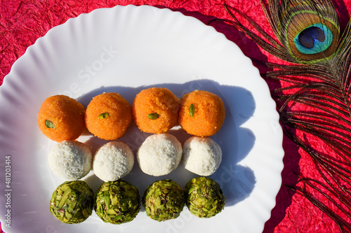 Photography Happy republic day and Happy Independence day celebrationg with Tricolor Tiranga jhanga theme three colours laddu or ladoo sweets