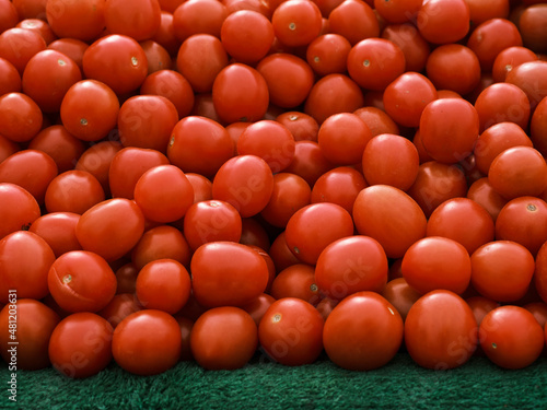 fresh red tomatoes in the supermarket