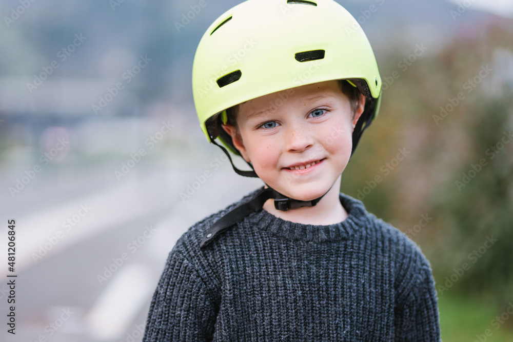 Content boy in protective helmet Content boy in protective helmet