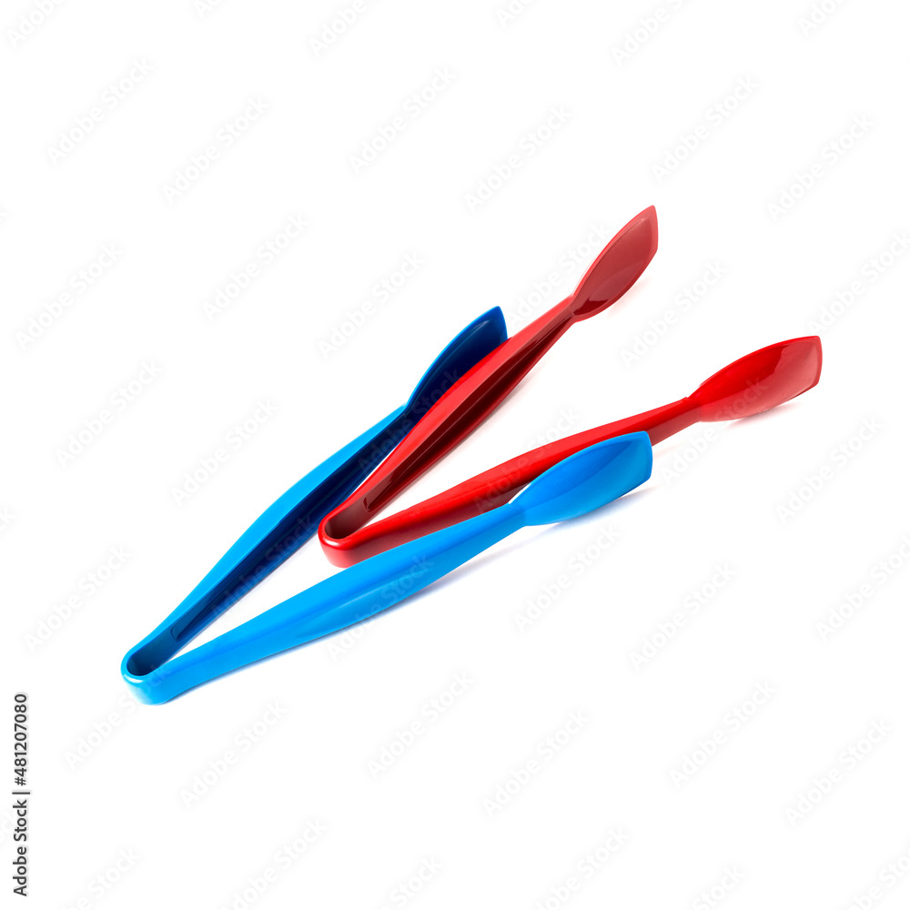 Tongs for meat on a white isolated background. Tongs for meat on a white isolated background.