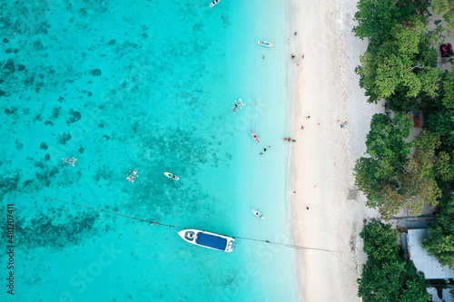 Coral island, koh He, beach and boats in Phuket province, Thailand © pierrick