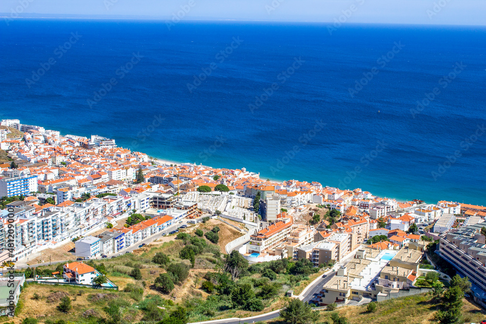 view of the seaside town of Sesimbra, Portugal. 