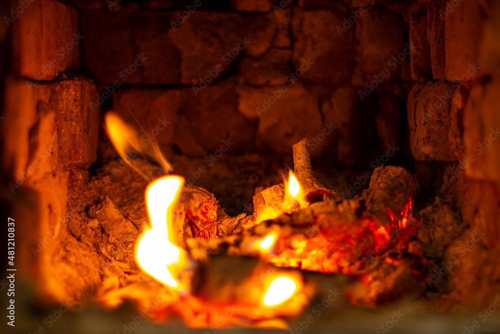 Beautiful small fire in the stove or fireplace close-up