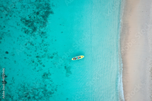 Coral island, koh He, beach and boats in Phuket province, Thailand