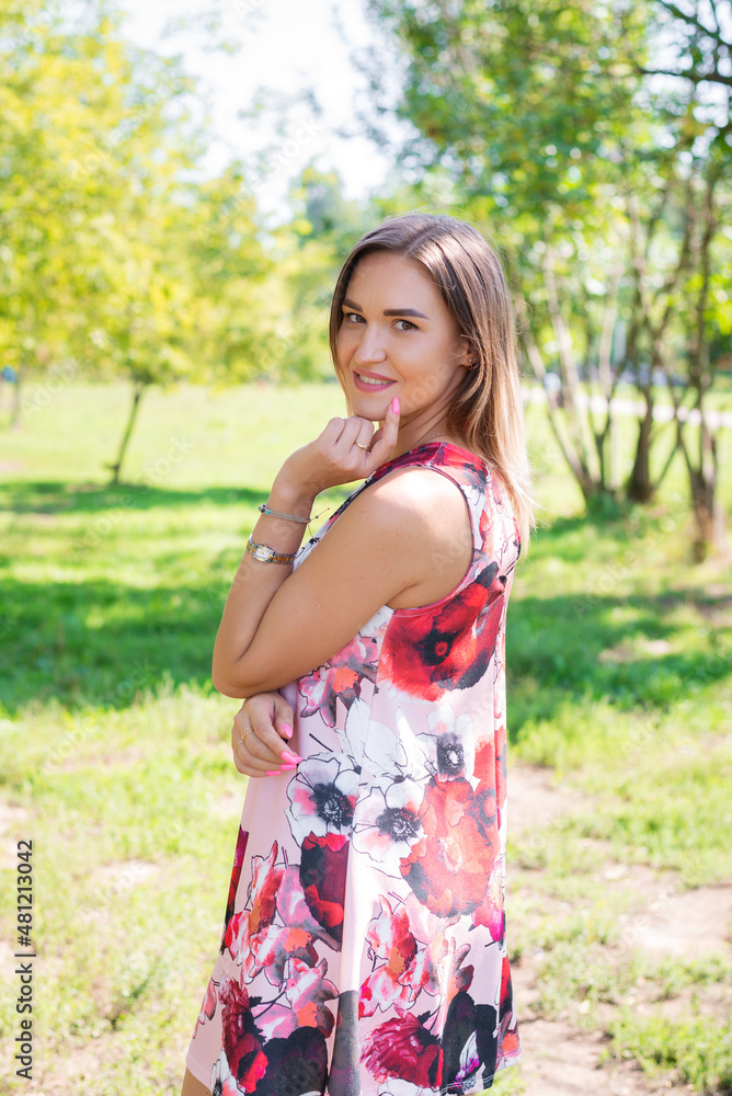 Portrait of a young beautiful girl in dress outdoors. Portrait of a young beautiful girl in dress outdoors.