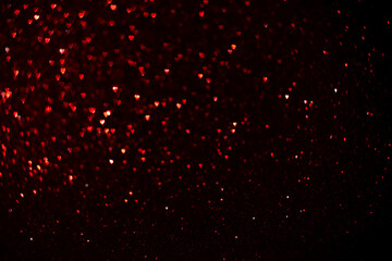 Red hearts, sparkling glitter bokeh background, valentines day abstract defocused texture