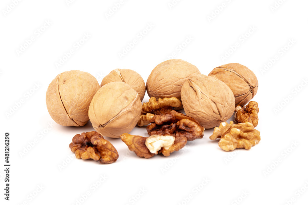Walnuts in shells isolated on white background. Package design element with clipping path. Walnuts in shells isolated on white background. Package design element with clipping path.