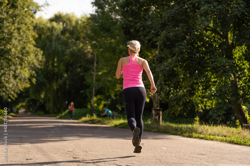 Jogging woman running in park