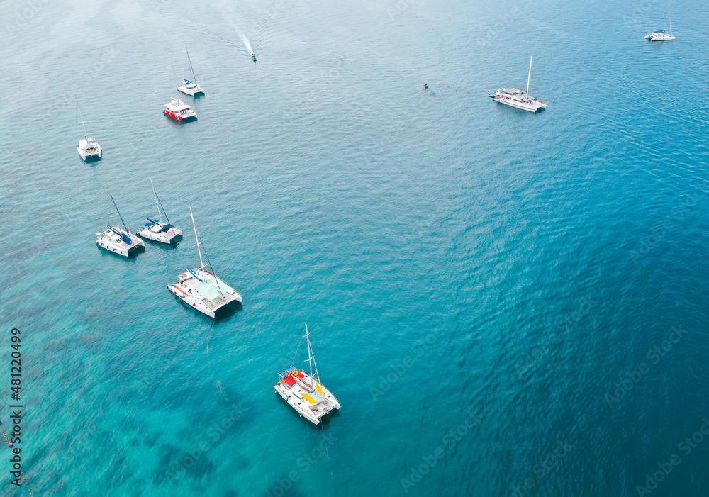 Coral island, koh He, beach and boats in Phuket province, Thailand