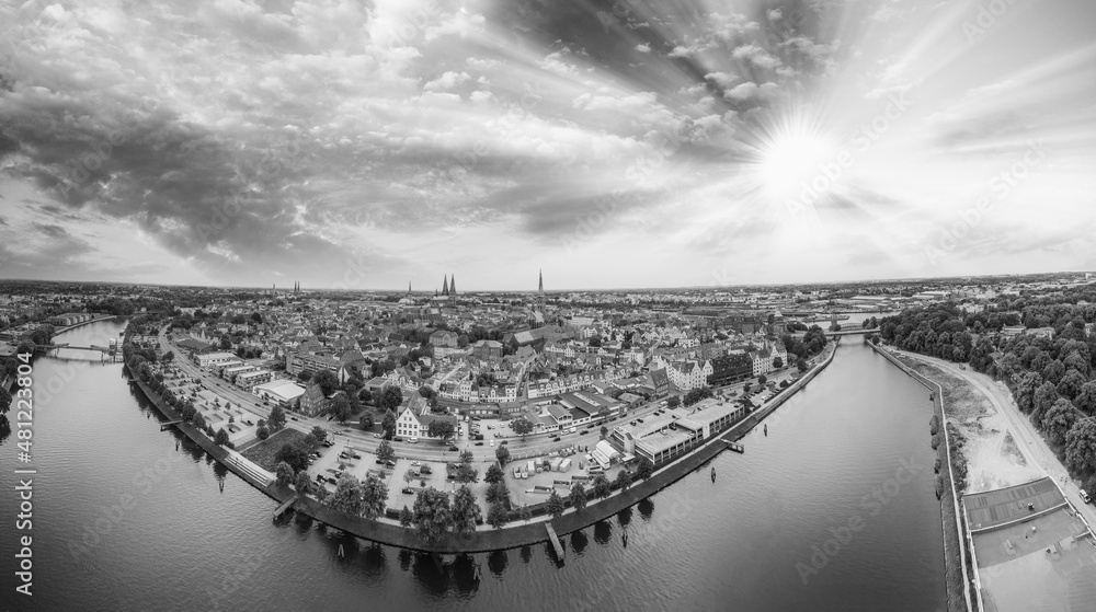 Panoramic aerial view of Lubeck cityscape on a cloudy day, Germany.