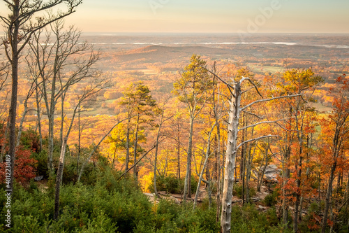 Autumn view above the trees from Little Pinnacle at Pilot Mountain State Park in Pinnacle  NC.