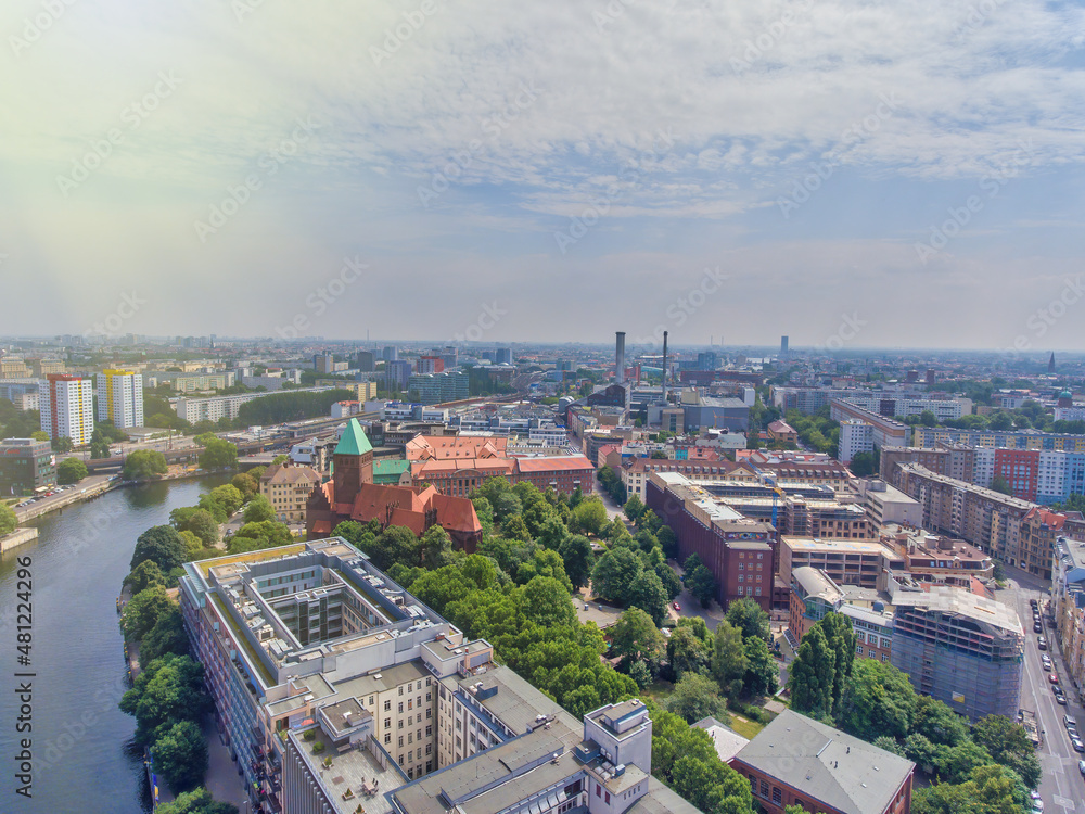 Aerial view of Berlin cityscape from drone in summer season with city landmarks and blue sky, Germany