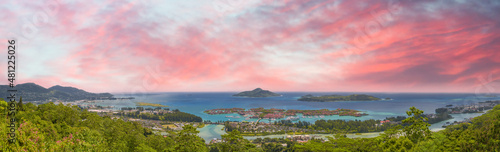 Panoramic aerial view of Eden Island and Mahe seascape from the hill at sunset, Seychelles.