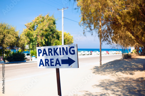 Parking area sign near sandy beach in Kamiros Rhodes Greece