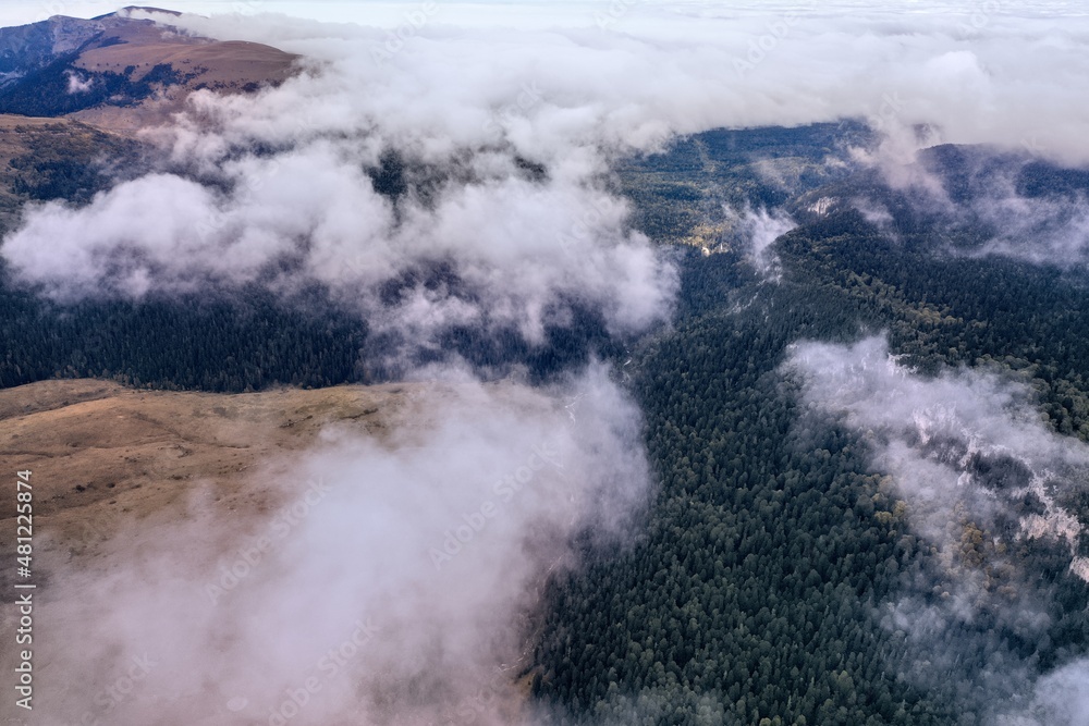 aerial view of clouds in the mountains