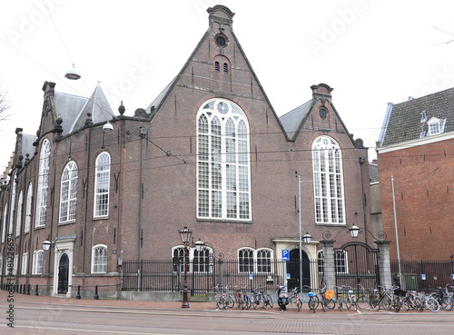 Foto Old Lutheran Church Brick Building in Amsterdam, Netherlands