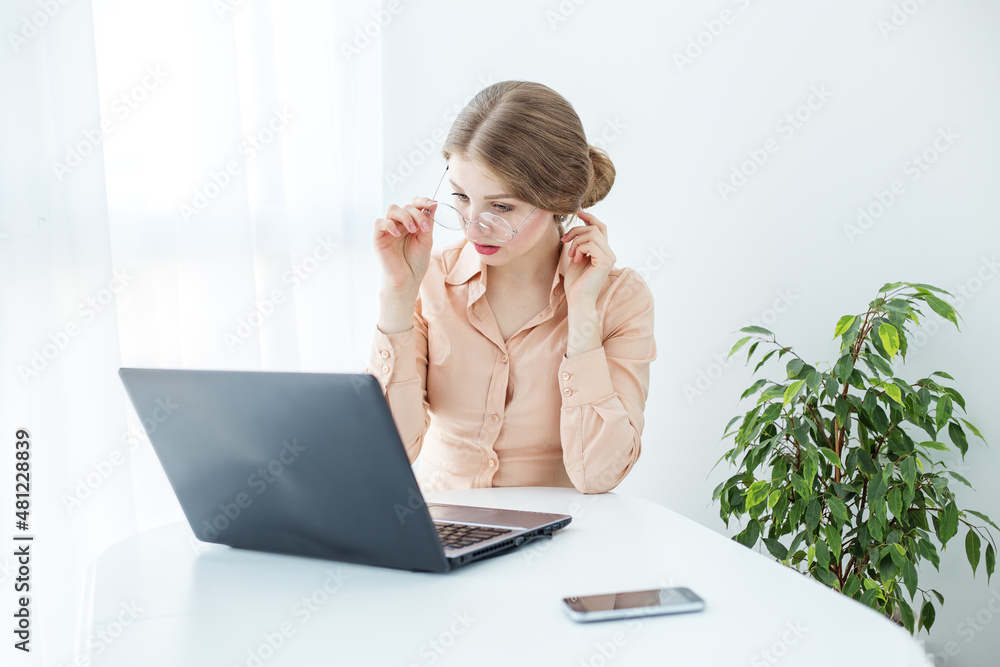 Business woman works remotely. Manager is using laptop. Brainstorm. Comfortable place to work.