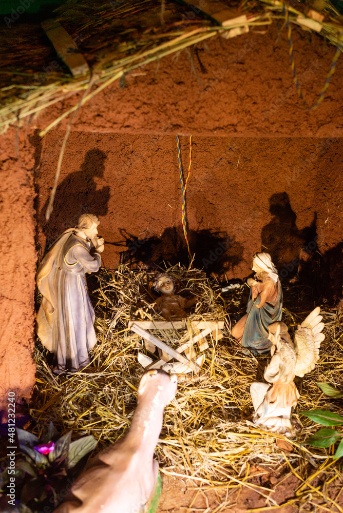 Rustic Christmas Cribs on display in Goa India. Hand crafted and painted Mockup and real life figurines of Nativity scene.