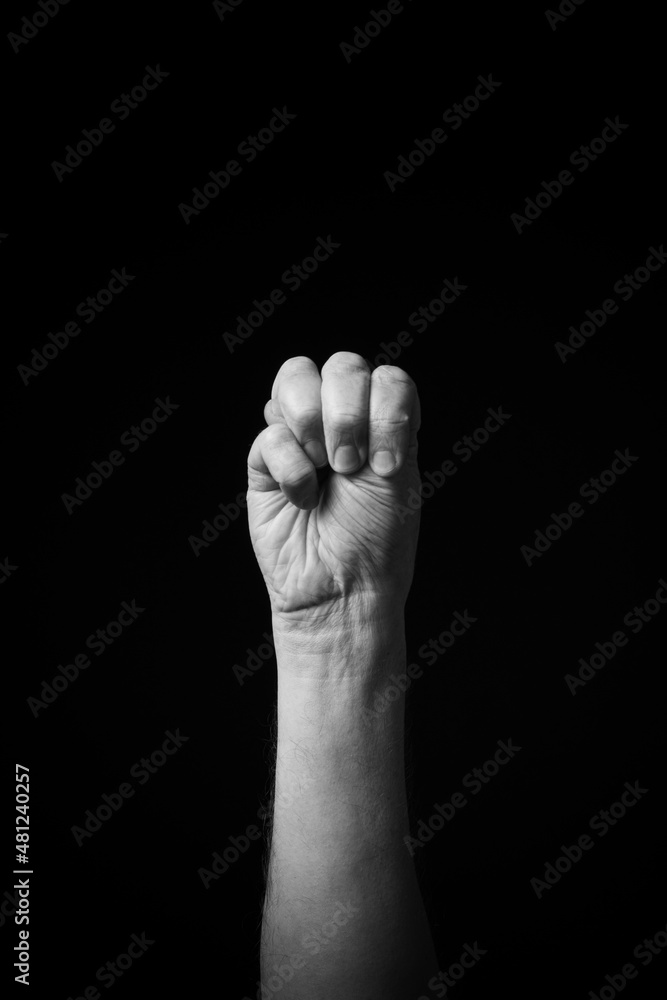 B+W image of hand demonstrating Chinese sign language letter M isolated against black background B+W image of hand demonstrating Chinese sign language letter M isolated against black background