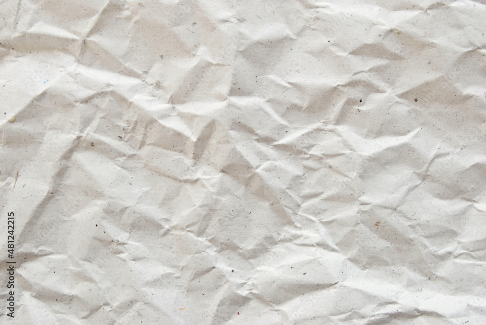 White wrinkled paper texture, a sheet of recycled white watercolor paper as background White wrinkled paper texture, a sheet of recycled white watercolor paper as background