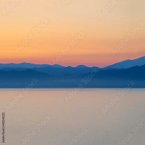 The Mediterranean coast of Italy at dawn as a colourful background abstract