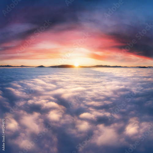 Thick clouds in the mountains at dawn. Beautiful aerial landscape with thick fog against dramatic sunset sky. © Артур Ничипоренко