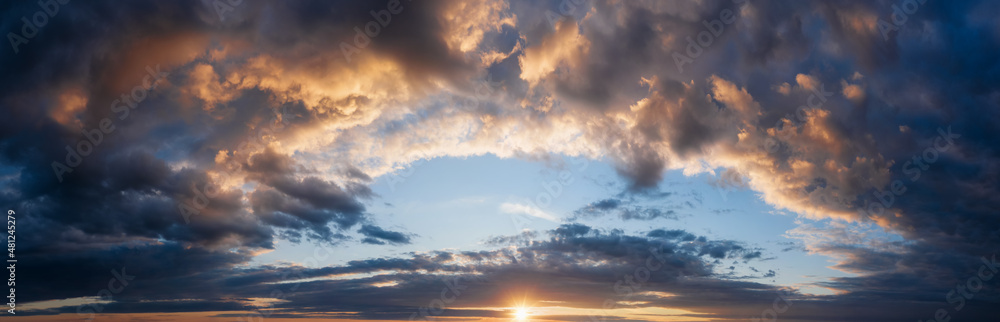 Beautiful panorama of cloudy sunset sky.