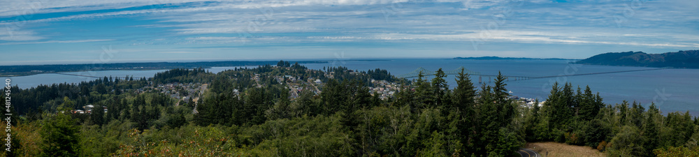 A panoramic view of the city of Astoria, Columbia River and the Columbia River Bridge that reaches 4.2 miles from Astoria to meagle in Washington