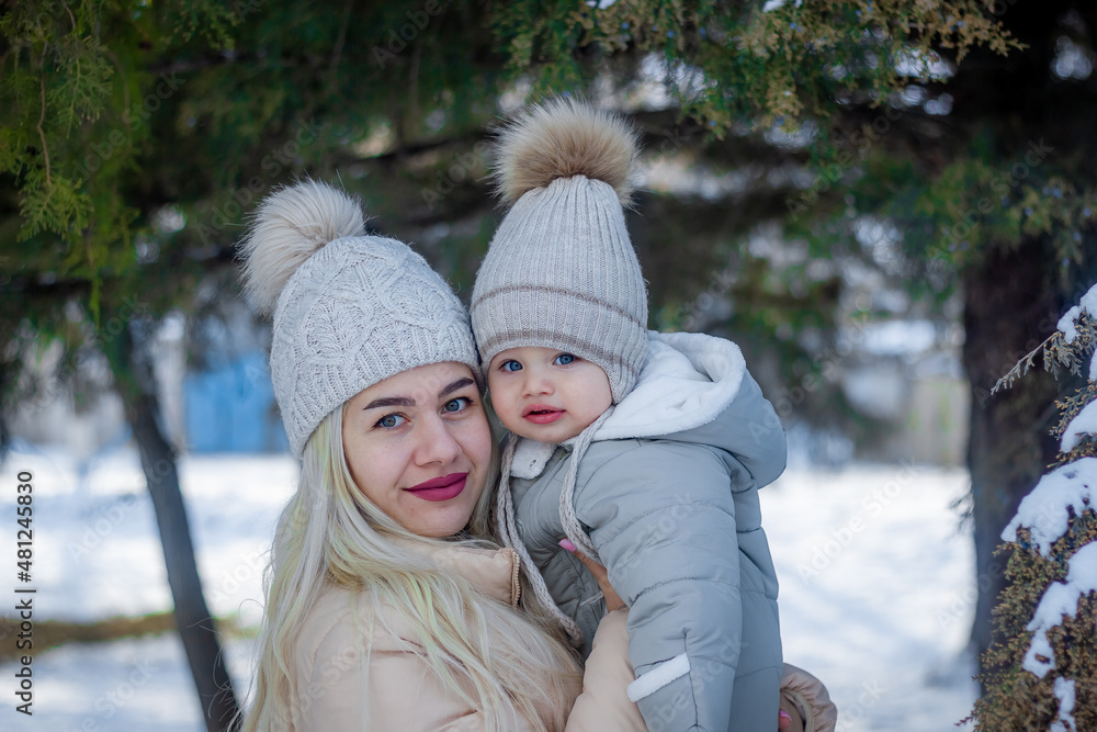 mother and baby boy in winter, parent and child in winter