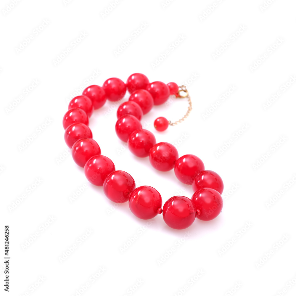 Red round beads isolated on white background Red round beads isolated on white background