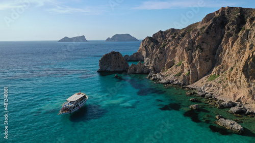 Aerial drone photo of beautiful emerald crystal clear beach and rocky bay of Plathiena, Milos island, Cyclades, Greece