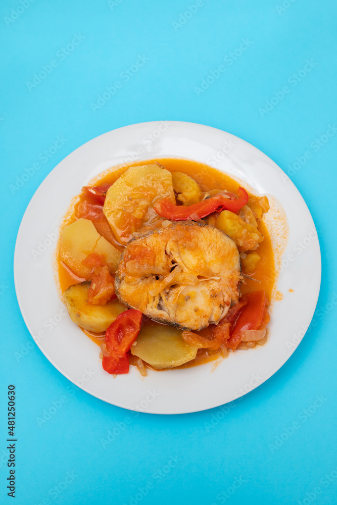 typical portuguese fish stew on white plate typical portuguese fish stew on white plate