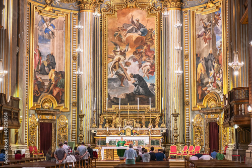 Rome, Italy - October 13, 2019 - view of the majestic interior of the catholic church during worship