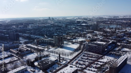 Winter aerial view of a snow covered residential Holland