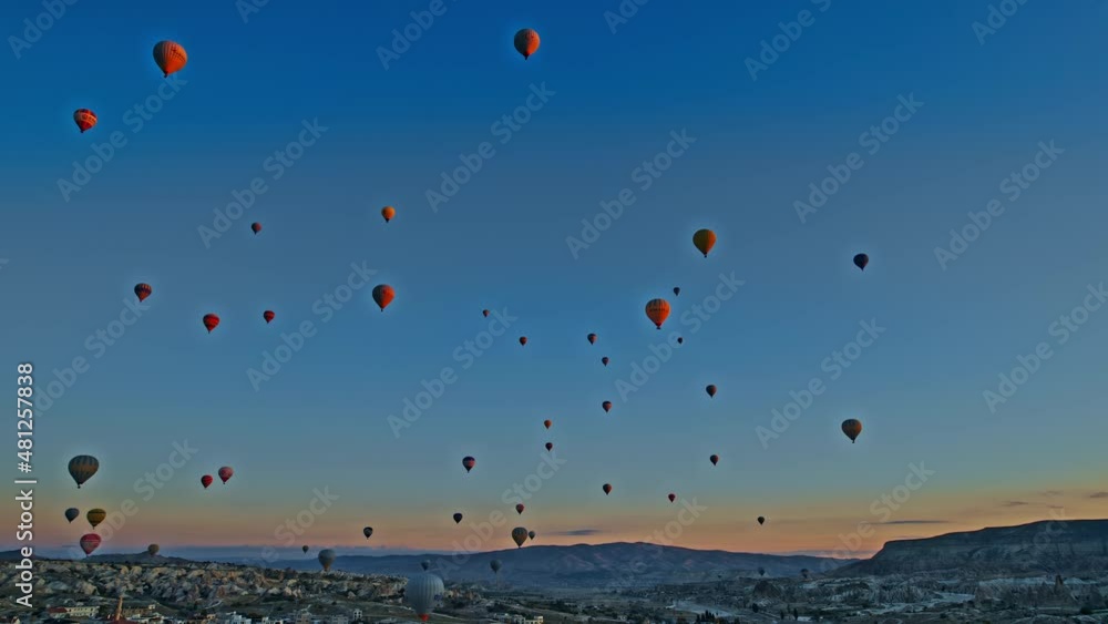 Aerial drone view of colorful hot air balloon flying Aerial drone view of colorful hot air balloon flying