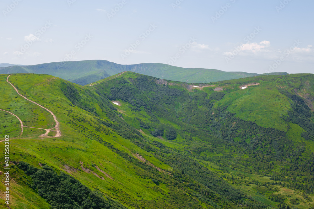 Panoramic views of the beautiful landscape in the Carpathian mountains. Tourism or Freedom concept. Wild nature, summer landscape. Discover the beauty of earth.