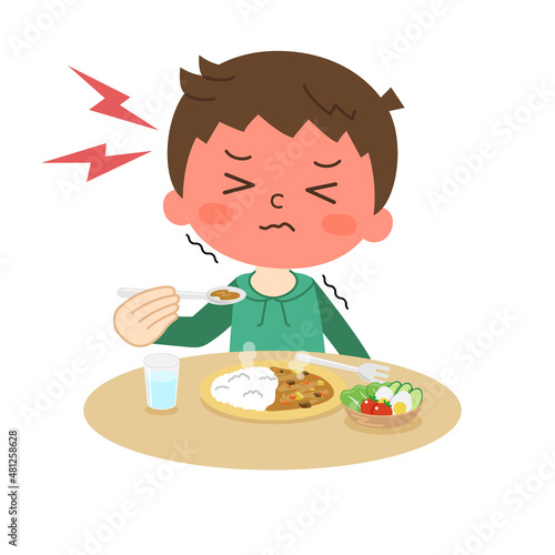 カレーライスを食べて辛い思いをする男の子