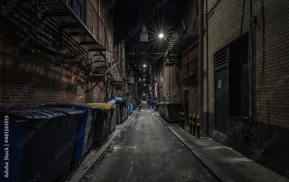Dark abandoned alley at night