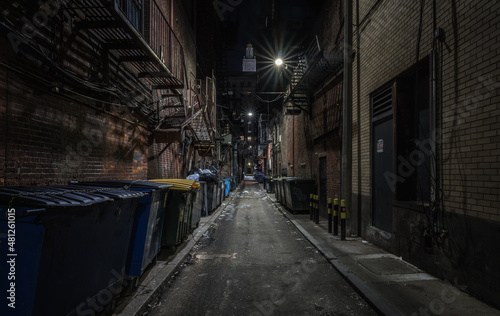 Dark abandoned alley at night © reinaroundtheglobe