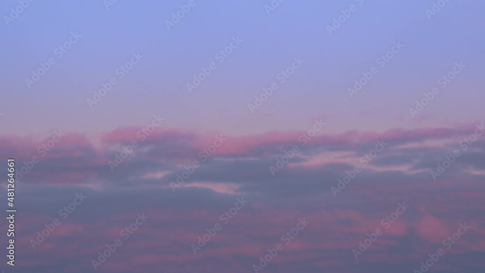 Sunset clouds moving across the sky - scenic aerial view in real time Sunset clouds moving across the sky - scenic aerial view in real time
