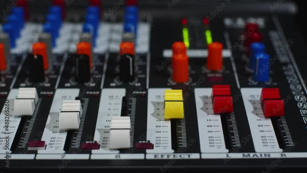 The sound engineer is finishing work on sound processing. End of work concept The sound engineer is finishing work on sound processing. End of work concept