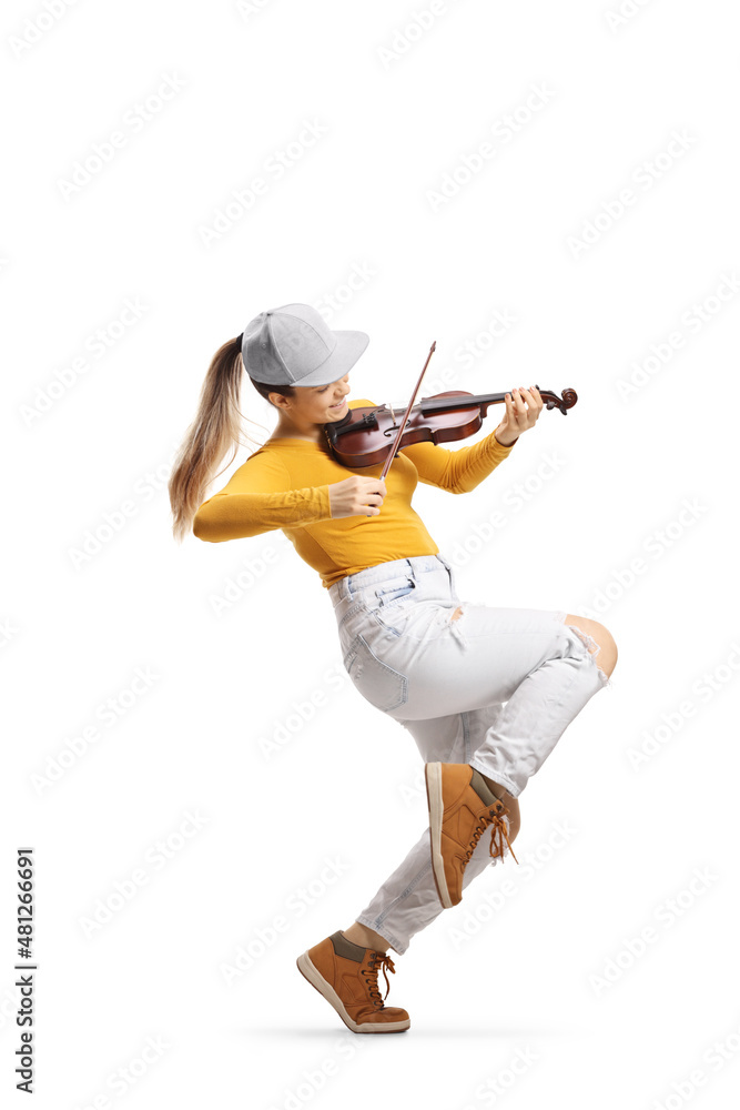 Full length shot of a trendy female violinist playing - obrazy, fototapety, plakaty 