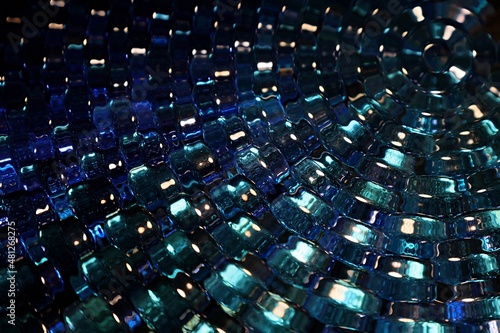Abstract design,small blue glass lenses,decorative nuggets.