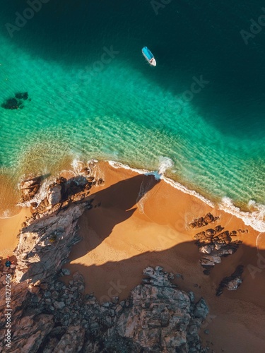 Drone view of cliff and beach in Cabo San Lucas photo