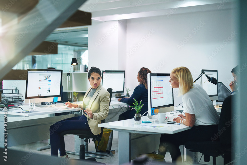 Success is the product of teamwork. Shot of corporate colleagues working together in their office. Success is the product of teamwork. Shot of corporate colleagues working together in their office.