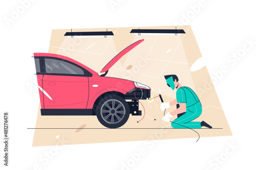 Mechanic in uniform check vehicle and repair