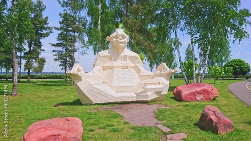 Panorama with Troll Zen sculpture, park and lake, Mezhyhirya Residence, Ukraine photo