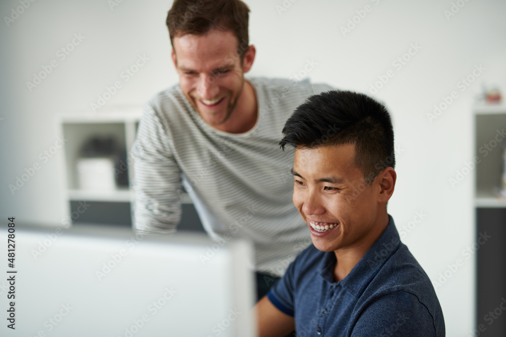 They're idea people. High angle shot of two designers working together on a project in an office. They're idea people. High angle shot of two designers working together on a project in an office.